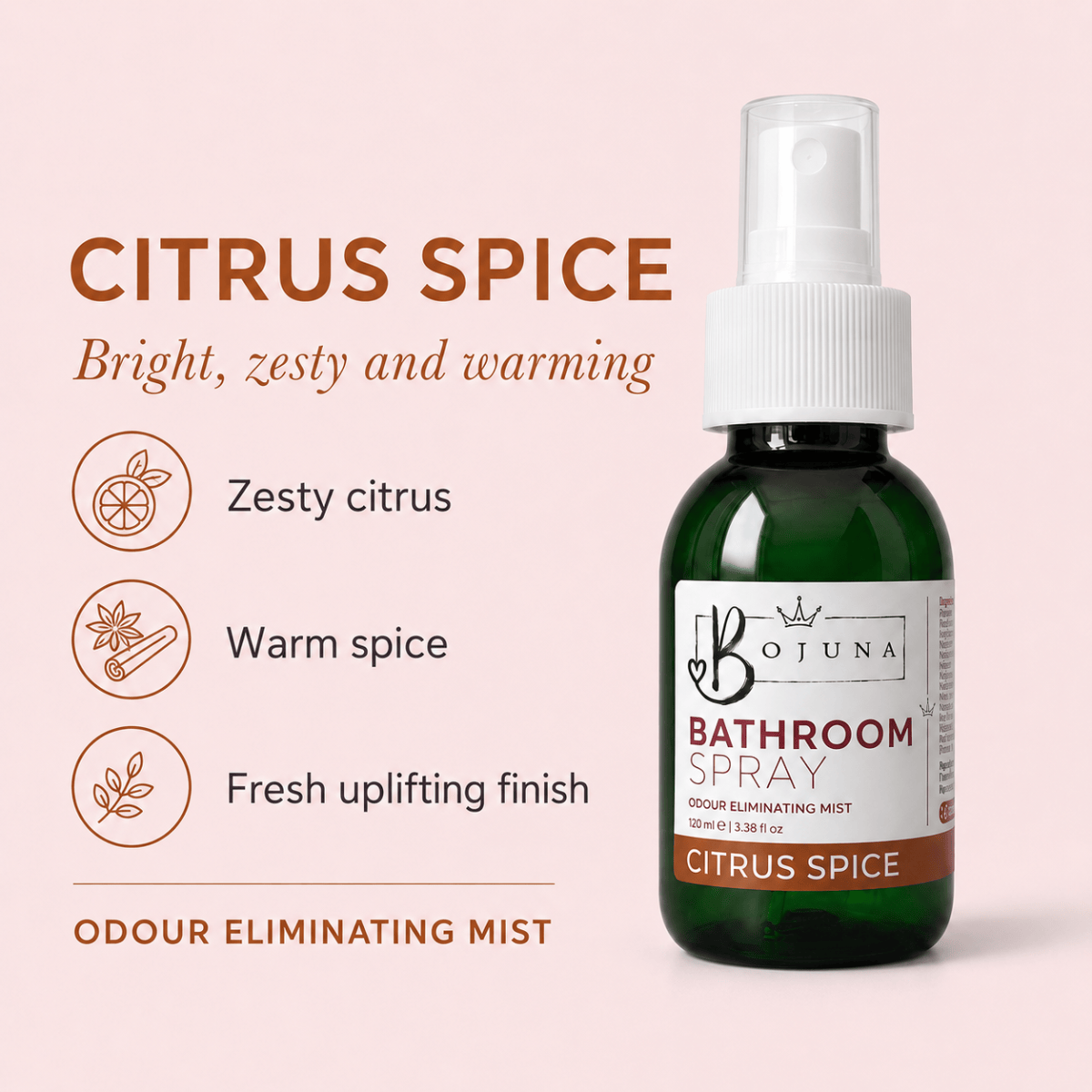 A bottle of Bojuna Citrus Spice Bathroom Spray on a pale pink background with descriptive text and icons highlighting zesty citrus, warm spice, and fresh uplifting finish.