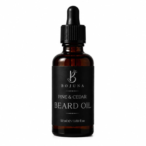 A 50ml amber glass dropper bottle of Bojuna Pine & Cedar Beard Oil with a black label and black dropper cap, set against a plain white background.