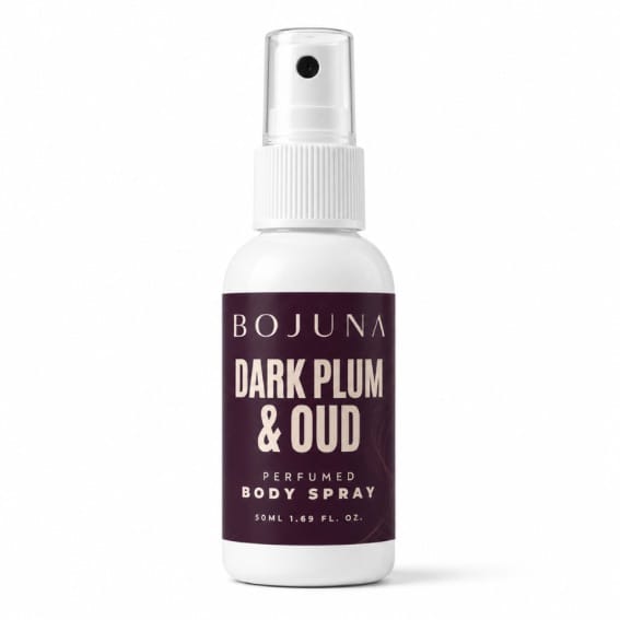 A 50ml bottle of Bojuna Dark Plum & Oud Perfumed Body Spray, featuring a white bottle and cap with a dark plum purple label, set against a plain white background.