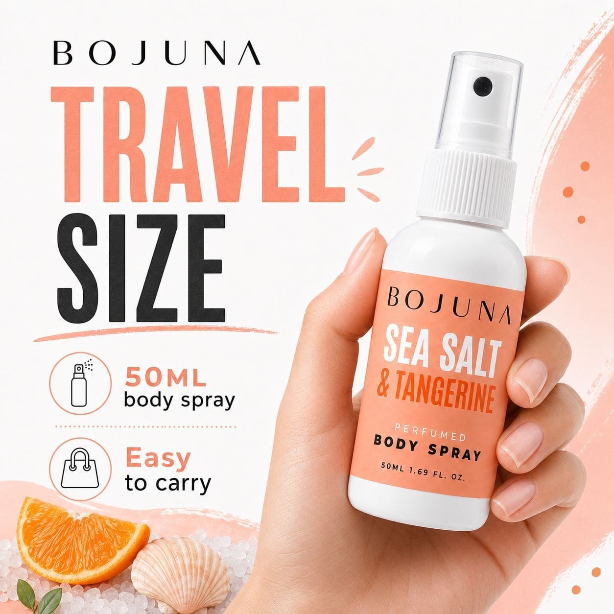 A hand holding a white BOJUNA Sea Salt & Tangerine travel-size body spray bottle against a light background with promotional text and beach-themed props.