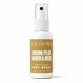 A 50ml spray bottle of BOJUNA Warm Pear Amber & Musk Perfumed Body Spray, featuring a white bottle and cap with a prominent mustard-gold label.