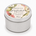 A round silver metal tin candle with a colorful fruit-themed lid label reading 'BOJUNA Summer FRUITS HAND POURED CANDLE 100 g e' on a white background.
