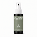 A 50 ml bottle of BOJUNA Car Perfume in the Bergamot & Earl Grey scent. The bottle is a dark amber glass with a matte olive green label and a white spray nozzle, set against a plain white background.