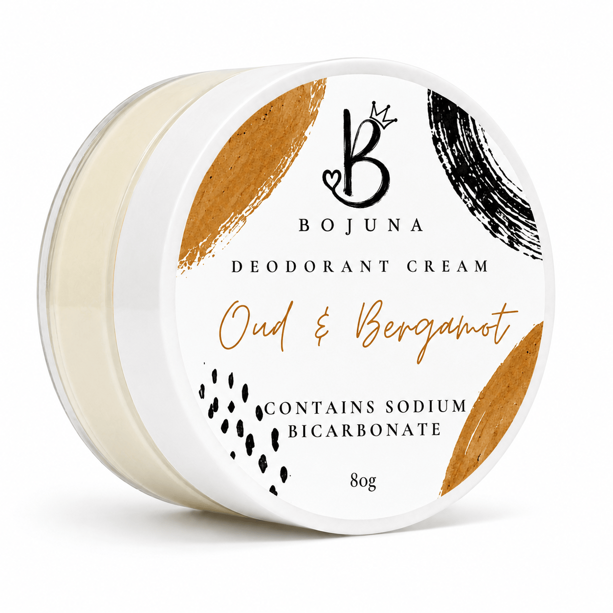 A round white plastic tub of Bojuna Oud & Bergamot Deodorant Cream, showing the cream inside and a decorative label with gold and black brushstrokes.
