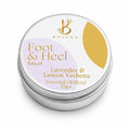 A round silver metal tin of Bojuna Foot & Heel Balm, featuring a white lid with lavender and gold graphics. The text on the lid reads 'Foot & Heel BALM', 'Lavender & Lemon Verbena', and 'Essential Oil Blend 25g'.