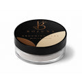 A clear plastic jar of Bojuna Grooming Clay in the shade Medium Hold, featuring a black lid with gold lettering and a color swatch showing the medium brown powder.