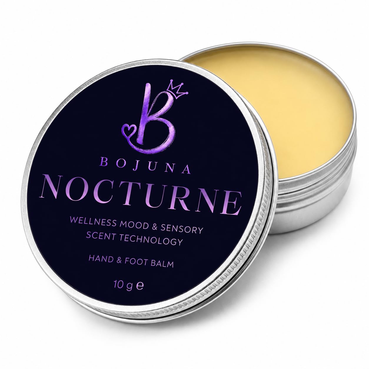 An open round silver tin of Bojuna Nocturne Hand & Foot Balm, showing the pale yellow balm inside next to its dark navy blue lid with purple text and logo.