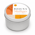 A round silver metal tin candle with a white lid label featuring orange and beige geometric graphics and the text 'BOJUNA Mango SCENTED CANDLE 100g'.