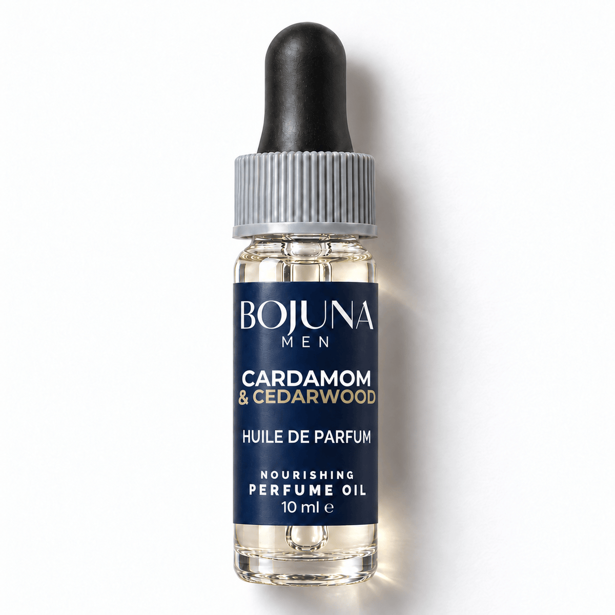 Bojuna Men Cardamom & Cedarwood nourishing perfume oil 10 ml, lying flat on white with a navy label, white first scent line and grey dropper cap.