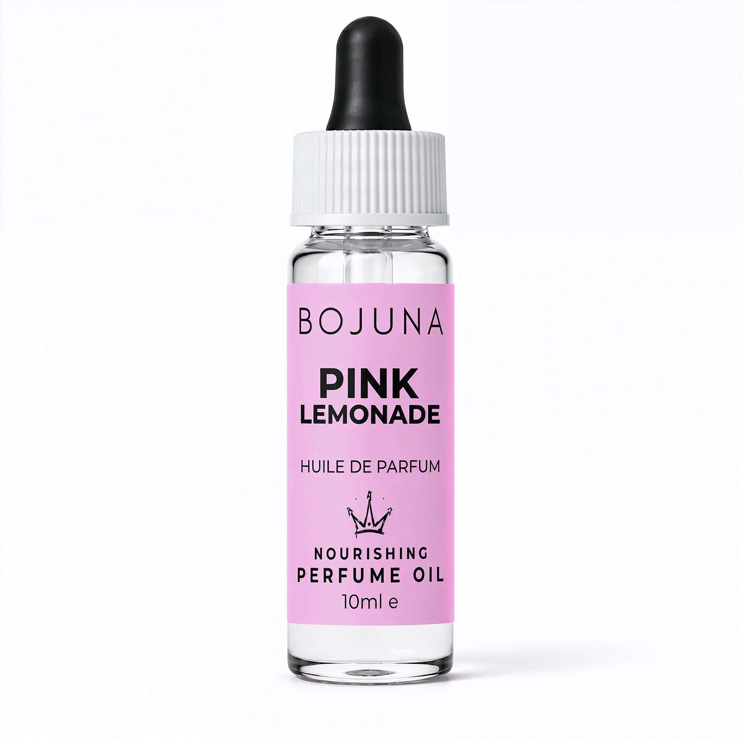 A 10ml glass dropper bottle of BOJUNA Pink Lemonade perfume oil, featuring a light pink label with black text and a white ribbed cap with a black dropper bulb, set against a plain white background.
