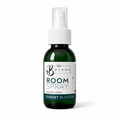 A 120 ml dark green glass room spray bottle with a white spray cap and a white label reading 'BOJUNA ROOM SPRAY SUNSET BLOSSOM'.