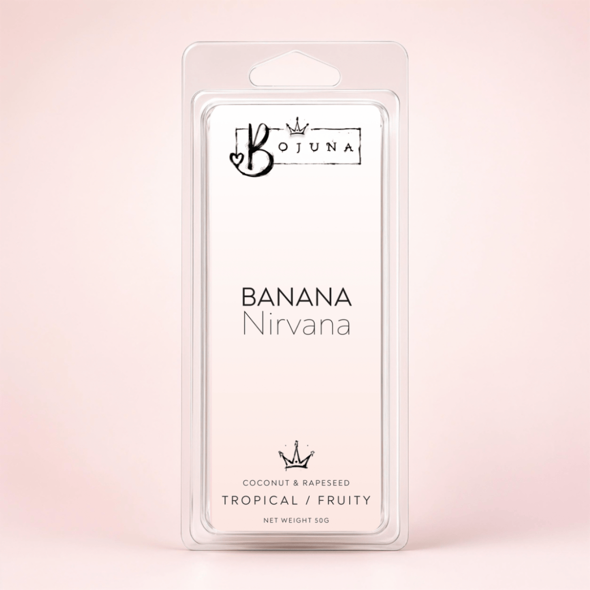 Bojuna Banana Nirvana wax melts in a clear plastic clamshell package with a white insert card, set against a soft pink background.
